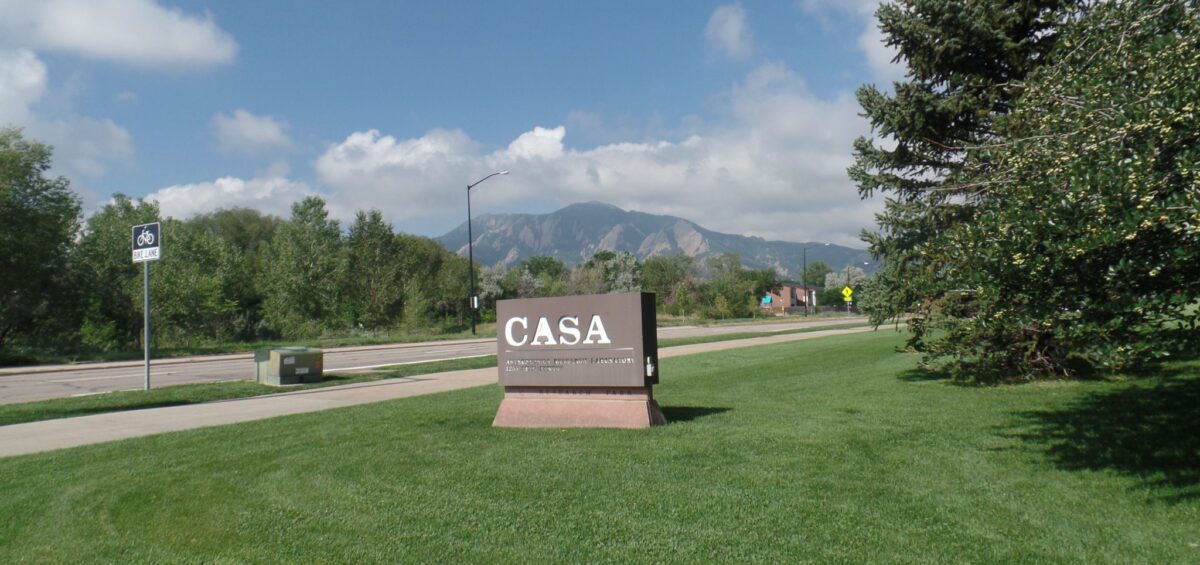 Bicycle Sign Near a Road and CASA Sign Before the Facility