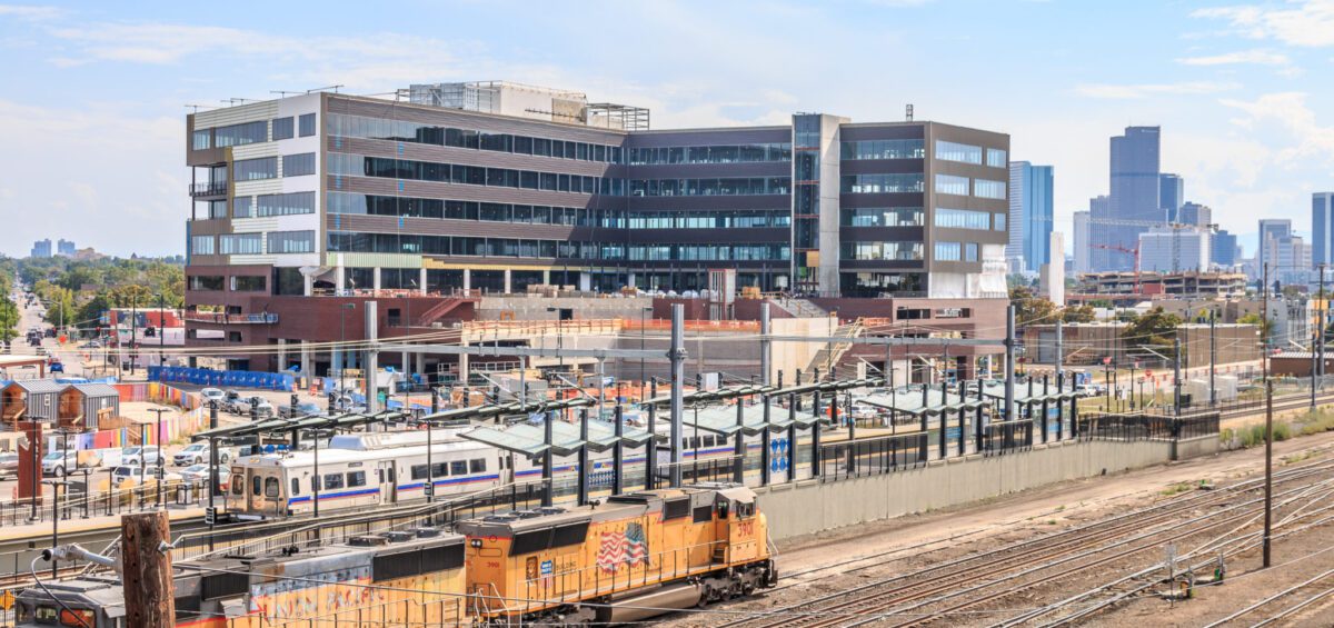 A Train on Track in Front of The HUB RINo